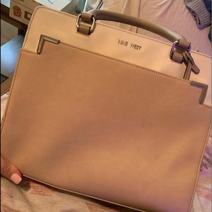 Nine West purse with strap.